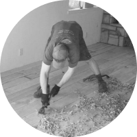 Tracy Thibodeau hand scraping custom hardwood floors